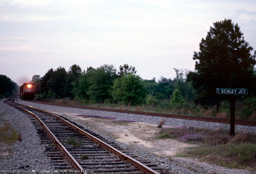 Norfolk Southern C39-8 #8638 past the junction switch (the main track bypasses Moultrie while the old route goes thru town) 